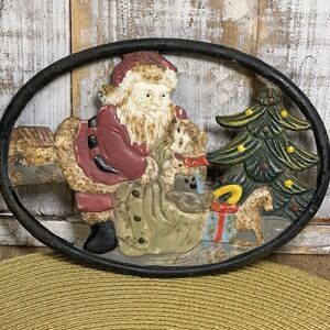 Vintage Christmas 8" Cast Iron Oval Trivet/Hot Plate Holder Santa w Toy Bag Tree